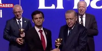 Erdoğan şampiyonluğu iptal edilen Akyüz'ü ödüllendirdi